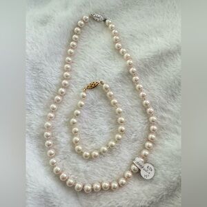 Faux Pearl Necklace 18” silver tone clasp and Bracelet 7” gold tone clasp $25